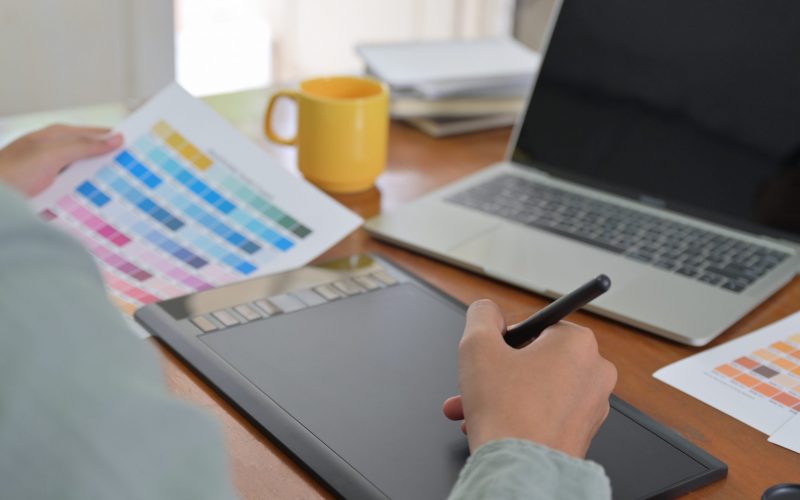 Designers are using modern digital design tools in offices.